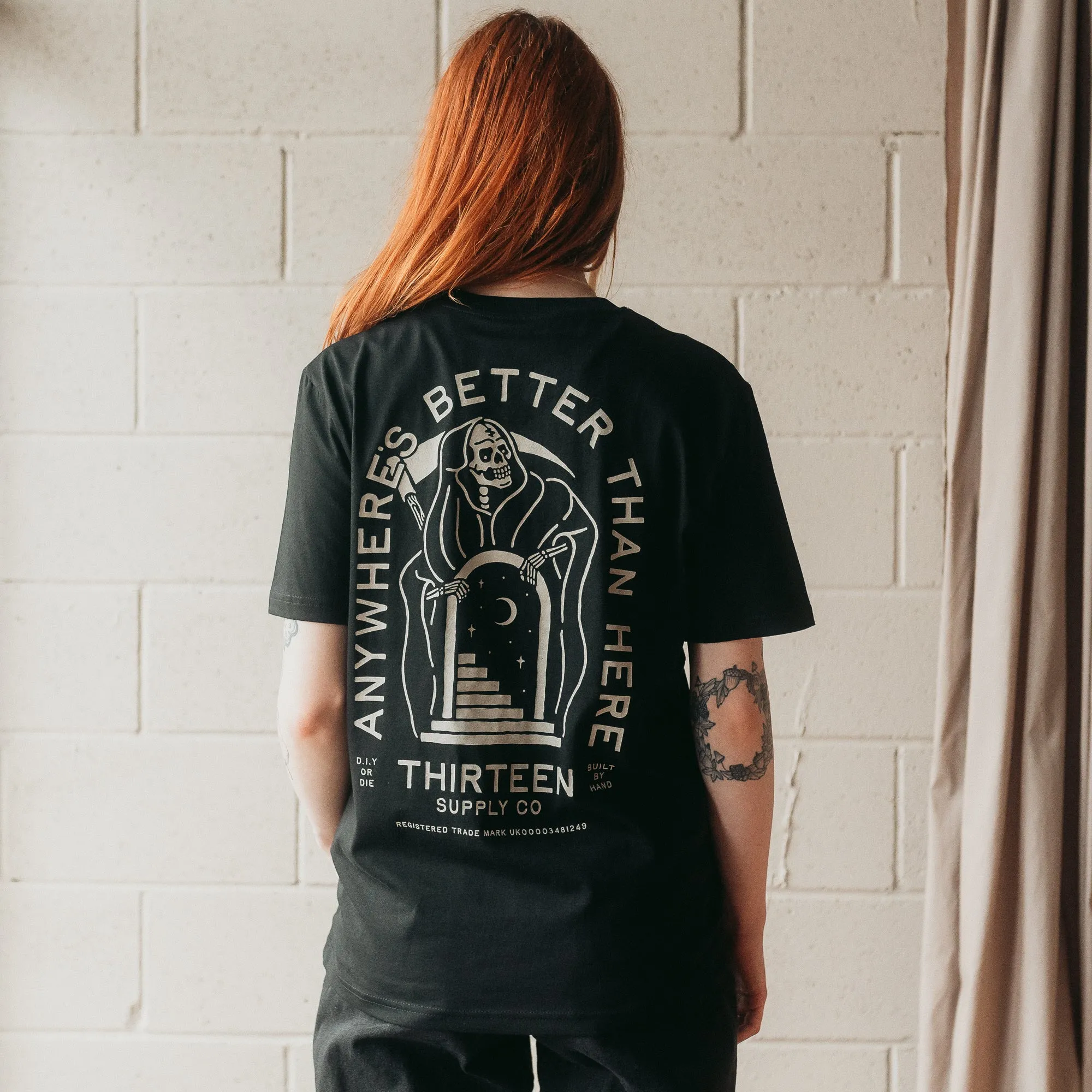 ANYWHERE'S BETTER THAN HERE - BLACK UNISEX T-SHIRT